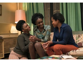 This image released by Annapurna Pictures shows Teyonah Parris, from left, KiKi Layne and Regina King in a scene from "If Beale Street Could Talk."