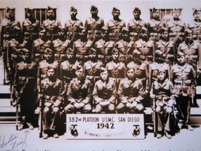 In this photo provided by the Nez family, Chester Nez, standing front left, of Albuquerque, N.M., poses with the first group of Navajo code talkers in 1942 in San Diego.  Nez, the last of the 29 Navajos who developed the code that stumped the Japanese during World War II, died Wednesday morning, June 4, 2014. He was 93.