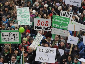 Franco-Ontarians protest cuts to French-language services by the Ontario government in Ottawa on Saturday.