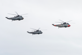Sea Kings conduct a flypast outside Victoria, BC on Saturday. Photo by LS Laurance Clarke.