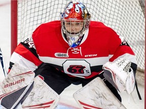 Goalie Mike DiPietro watches the play in front of him during his Ottawa 67's debut against the Gatineau Olympiques at TD Place arena on Saturday, Dec. 8, 2018.