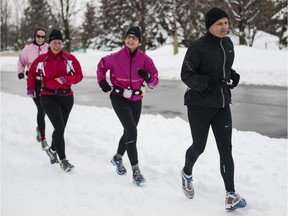 Joggers goes for a run along the Rideau Canal.