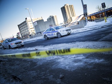 Ottawa police have the area around the Westboro transit station cordoned off with police tape and cruiser's Saturday Jan. 12, 2019. Three people were killed and many were injured after an OC Transpo double-decker bus crashed on the transit way Friday afternoon.