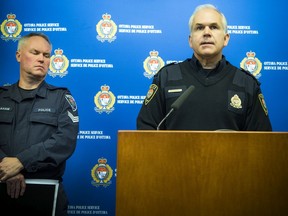 Ottawa Police Service Chief Charles Bordeleau, flanked by collision investigation Sgt. Cameron Graham, addresses the media on Saturday. (Photo: Ashley Fraser)
