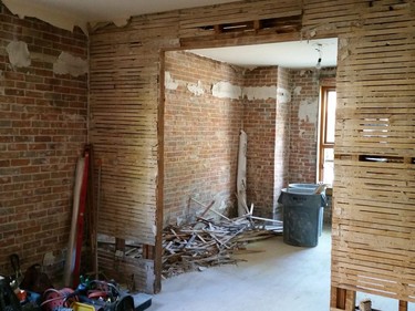 DURING: The first floor was completely gutted, right down to the brick. There is three layers of brick and previously, no insulation.