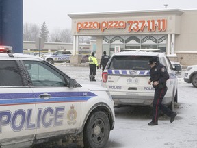 Police at the scene of a shooting at the Elmvale Mall in Ottawa on Thursday, January 31, 2019.
