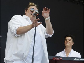 Jamie Fine, left, and Elijah Woods of the band Elijah Woods x Jamie Fine perform at Bluesfest in Ottawa on July 14, 2018.    (Photo: Patrick Doyle)