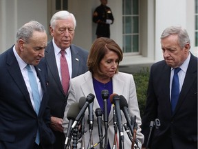 House Speaker Nancy Pelosi (D-CA), centre, will carefully mull her party's strategy on impeaching President Donald Trump.