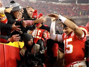 Patrick Mahomes of the Kansas City Chiefs celebrates with fans after the Chiefs defeated the Indianapolis Colts to win the AFC divisional round playoff game at Arrowhead Stadium on Saturday, Jan. 12, 2019.