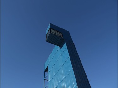 The new sales centre includes a seven-storey observation tower created from recycled shipping containers to give a bird's eye view of the site.