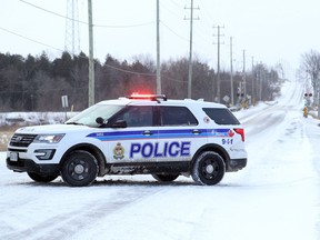 A snowy Moodie Drive was closed Thursday due to a two-car collision that critically injured one woman and injured two other people.