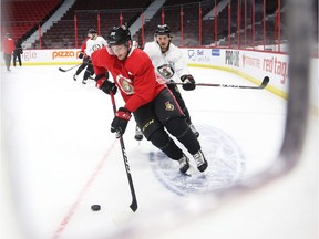 Matt Duchene, front, and Thomas Chabot of the Senators participate in a practice drill at Canadian Tire Centre on Tuesday