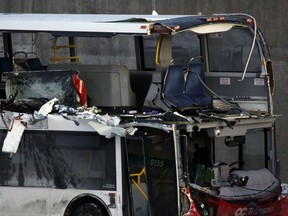 The OC Transpo bus involved in Friday's crash at Westboro Station was towed from the scene on Saturday, revealing extensive damage.