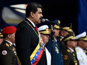 Venezuela's President Nicolas Maduro delivers a speech during the ceremony in which the Bolivarian National Armed Forces (FANB) recognize him after his inauguration for a second term, at the Fuerte Tiuna Military Complex, in Caracas on January 10, 2019.