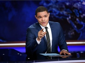 Trevor Noah works on set during a taping of "The Daily Show with Trevor Noah" on Tuesday, Sept. 29, 2015, in New York.