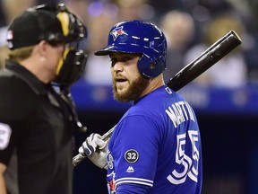 Russell Martin (55) has words with home plate umpire Tripp Gibson during a Blue Jays game last May 18.