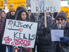 Farhat Rehman, (R) a member of MOMS / Mothers Offering Mutual Support, talks about the difficulty of phoning her son in prison as a demonstration is held Wednesday on #BellLetsTalk day outside 160 Elgin St, offices of Bell Canada, against the Ontario jail phone system run by Bell Canada.