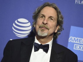 FILE - In this Thursday, Jan. 3, 2019 file photo, Peter Farrelly arrives at the 30th annual Palm Springs International Film Festival in Palm Springs, Calif. Green Book" director Farrelly says he's deeply sorry and embarrassed after film website The Cut found an old story where colleagues said Farrelly liked to flash his genitals as a joke. The Cut on Wednesday, Jan. 9, 2019, published excerpts of a 1998 Newsweek story saying Farrelly liked to use ruses to get people to look at his penis.
