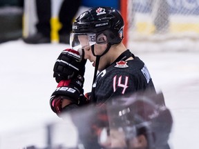 Canada's Maxime Comtois rests his head on his glove after losing to Finland during overtime quarter-final IIHF world junior hockey championship action in Vancouver on Wednesday, Jan. 2, 2019. A week after being the target of trolls on social media, Quebec-born forward Maxime Comtois spoke out publicly for the first time Wednesday.
