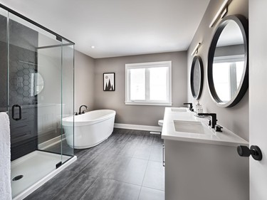 : Separated from the secondary bedrooms, the master suite in the Cumberland has a true spa-like feel, particularly in the ensuite, where glass-enclosed showers and free-standing tubs are standard.