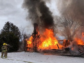 A photo from police for MRC des Collines-de-l'Outaouais shows fire as it destroyed a home in the Breckenridge district of the Pontiac Municipality on Saturday.