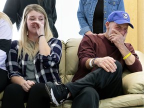 In this Thursday, Jan. 3, 2019 photo, T. Scott Marr and his daughter, Preston Marr, left, break down during a press conference in Omaha, Neb. Thought to be brain dead, T. Scott Marr awakened after being taken off life support.