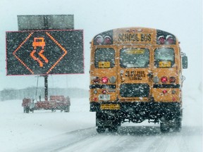 Most school buses are off the road due to teachers' job action Wednesday. Snowfall is on the way.