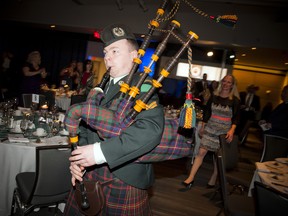 Cpl Walter McLeish, a piper from the Cameron Highlanders led in the head table Saturday night.