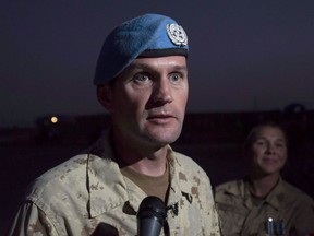 Canadian Task Force Commander Chris McKenna speaks with the media on the United Nations base in Gao, Mali, Saturday, December 22, 2018. The outgoing commander of Canada's peacekeeping mission in Mali is blaming distance for the fact Canadian medical helicopters remained on the ground during two deadly attacks on UN peacekeepers last fall.