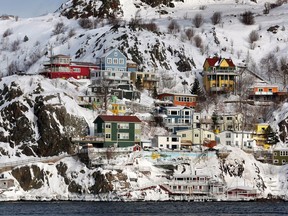 An overall view of the city after a winter storm hit St. John's. N.L., on January 5, 2014. As St. John's, N.L., thaws out from bitter January storms, one city councillor has proposed a solution that's been tried, tested and mostly abandoned in other Canadian cities: heated sidewalks. Coun. Sandy Hickman has asked the city's engineering staff look into a pilot project to heat a small section of downtown sidewalk that's already scheduled for repair work later this year.