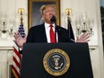 U.S. President Donald Trump speaks about the partial government shutdown, immigration and border security in the Diplomatic Reception Room of the White House, in Washington, Saturday, Jan. 19, 2019.