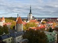 The Kiek in de Kok artillery tower, centre left, and St. Olaf's church tower, centre, stand on the skyline in Tallinn, Estonia, on Sunday, Oct. 16, 2016.