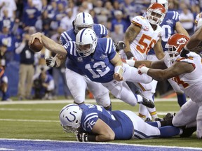 Indianapolis Colts quarterback Andrew Luck dives for a touchdown against the Chiefs during their wildcard game on Jan. 4, 2014. The Colts staged a legendary rally from a 38-10 third quarter deficit to win 45-44. (Michael Conroy/The Associated Press)