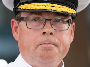Vice-Admiral Mark Norman speaks with reporters following an appearance at court in Ottawa on Sept. 4, 2018.