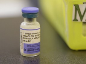 This file photo, shows a measles, mumps and rubella vaccine.