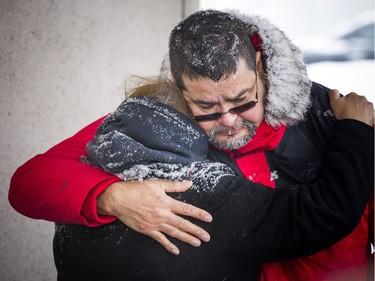 Don Eagle gave Jocelyn Wabano-Iahtail a hug during the gathering in memory of Greg Ritchie on Saturday.