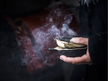 Jocelyn Wabano-Iahtail performed a smudging ceremony at Saturday's event.