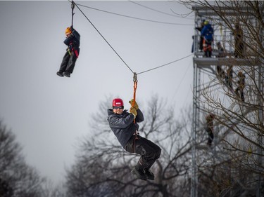 People enjoyed the sunshine in the Snowflake Kingdom in Jacques-Cartier Park Sunday Feb. 10, 2019 part of the Winterlude festivities.  Festival goers enjoyed the zip line over Snowflake Kingdom Sunday.