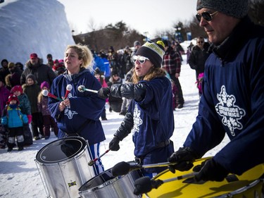 People enjoyed the sunshine in the Snowflake Kingdom in Jacques-Cartier Park Sunday Feb. 10, 2019 part of the Winterlude festivities. Zuruba drumming group entertained the crowds at the Snowflake Kingdom Sunday.