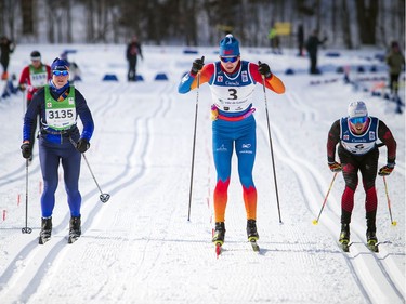 #3 Dominique Moncion Groulx and #6 Olivier Hamel push hard to the finish line during the 51km race finishing second and third at the Gatineau Loppet, Saturday Feb. 16, 2019.