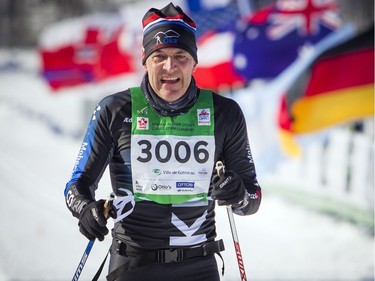 27km race third place winner Michel Labrie crosses the finish line at the Gatineau Loppet, Saturday Feb. 16, 2019.