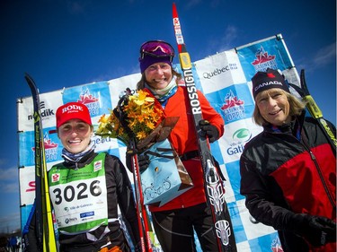 27km female winners from left, second place woman Coralie Beauchamp, first place Joann Hanowski and third place Christa Ramonat during the Gatineau Loppet, Saturday Feb. 16, 2019.   Ashley Fraser/Postmedia