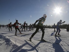 Skiers leave the start of the 27km free technique cross-country ski race at the Gatineau Loppet on Sunday, February 17, 2019.