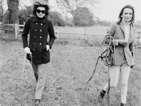 (FILE) - 2019 FEBRUARY 16: Style icon and the older sister of Jack Kennedy has died at the age of 85 of natural causes in New York. American socialite Jacqueline Kennedy Onassis (1929 - 1994) with her sister American socialite Lee Radziwill at a horse farm, UK, 15th November 1968.