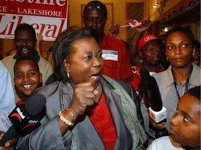 Liberal MP Jean Augustine celebrates her re-election victory in 2004 in her Etobicoke-Lakeshore riding. She was first elected as an MP in 1993.