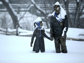 The memorial statues at Manotick's Remembrance Park, knee-deep in snow, and, like most of us, hopeful for an early thaw.