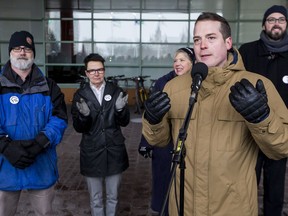 City councillors Jeff Leiper, Catherine McKenney, Theresa Kavanagh, Mathieu Fleury, and Shawn Menard attend a rally for affordable housing outside of Ottawa City Hall before City Council met to discuss budget 2019 on February 6, 2019. Several of the councillors are wearing a 1% button symbolic of the amount they are asking a levy to amount to in the budget. The rally was organized by ACORN and 6 other community groups demanding affordable housing.