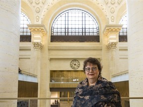 Sen. Paula Simons shows off the interior of the new Senate building, in Ottawa's former train station.