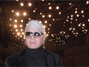 FILE: According to reports Karl Lagerfeld has died aged 85 - PARIS, FRANCE:  Fashion designer Karl Lagerfeld (R) is seen prior the presentation of his Chanel Haute Couture Spring-Summer 2000 collection, at the Equestrian Club of the Bois de Boulogne in Paris, 18 January 2000.