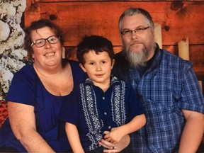Krista and Robert Ryan with their son, Xavier, 5. Xavier is on the autism spectrum and on a long waiting list for Intensive Behavioural Intervention therapy.